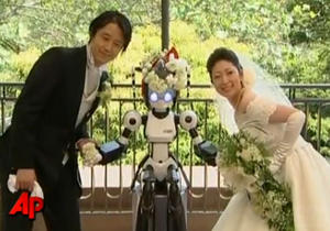 012c000003192300-photo-un-mariage-celebre-par-un-robot-au-japon.jpg